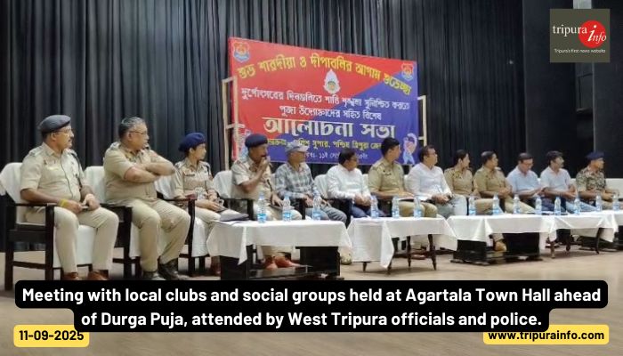 Meeting with local clubs and social groups held at Agartala Town Hall ahead of Durga Puja, attended by West Tripura officials and police.