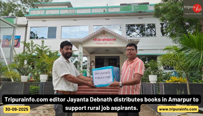 Tripurainfo.com editor Jayanta Debnath distributes books in Amarpur to support rural job aspirants.