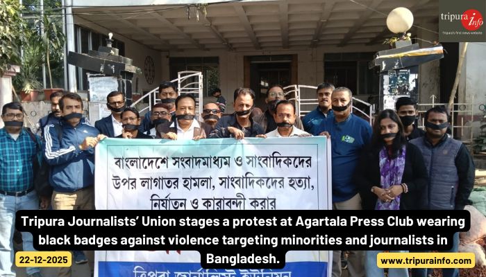 Tripura Journalists’ Union stages a protest at Agartala Press Club wearing black badges against violence targeting minorities and journalists in Bangladesh.