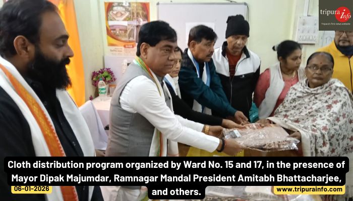 Cloth distribution program organized by Ward No. 15 and 17, in the presence of Mayor Dipak Majumdar, Ramnagar Mandal President Amitabh Bhattacharjee, and others.