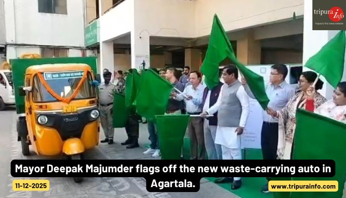 Mayor Deepak Majumder flags off the new waste-carrying auto in Agartala.