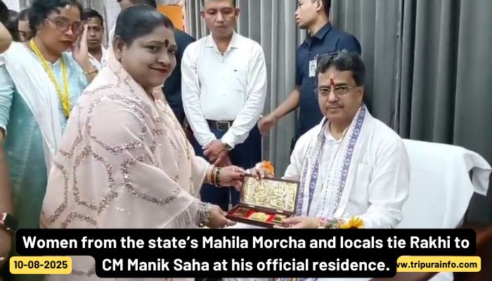 Women from the state’s Mahila Morcha and locals tie Rakhi to CM Manik Saha at his official residence.
